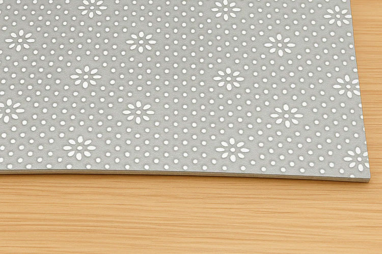 Non-skid gripping-dot backi of the designer cushioned rug pad