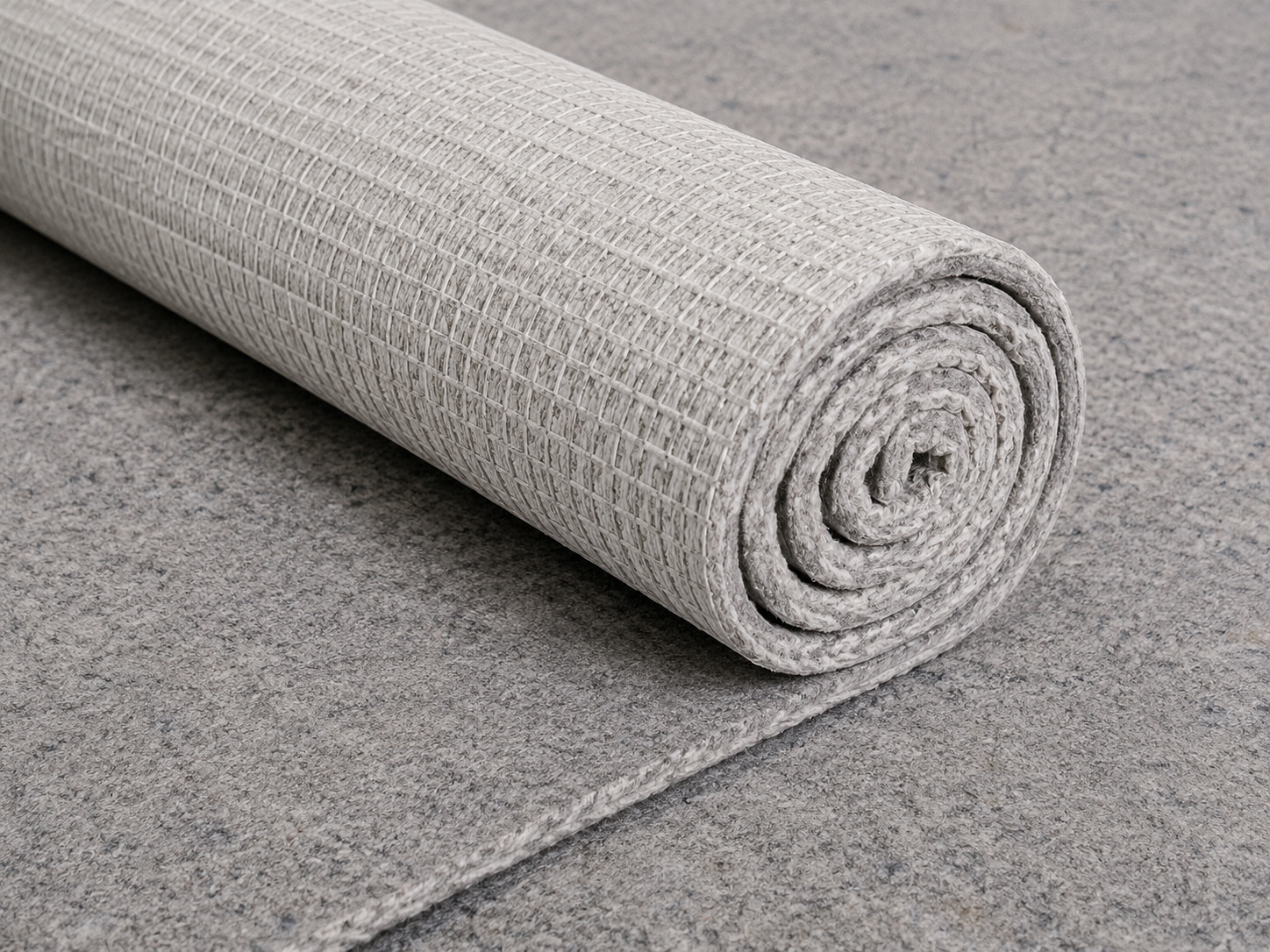 felt + rubber rug pad rolled