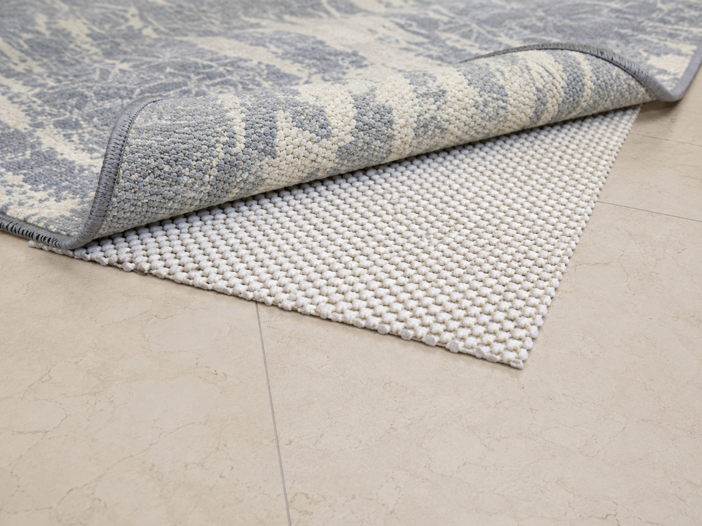 natural rubber non slip rug pad on tile