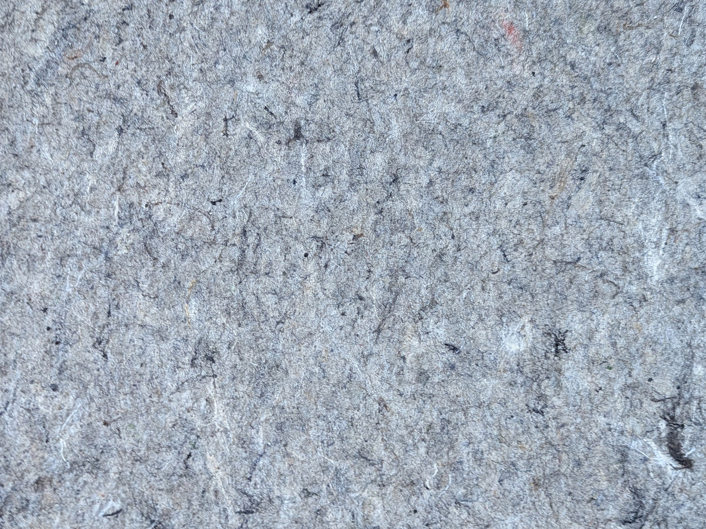 Recycled fiber surface of the low-profile all-surface rug pad