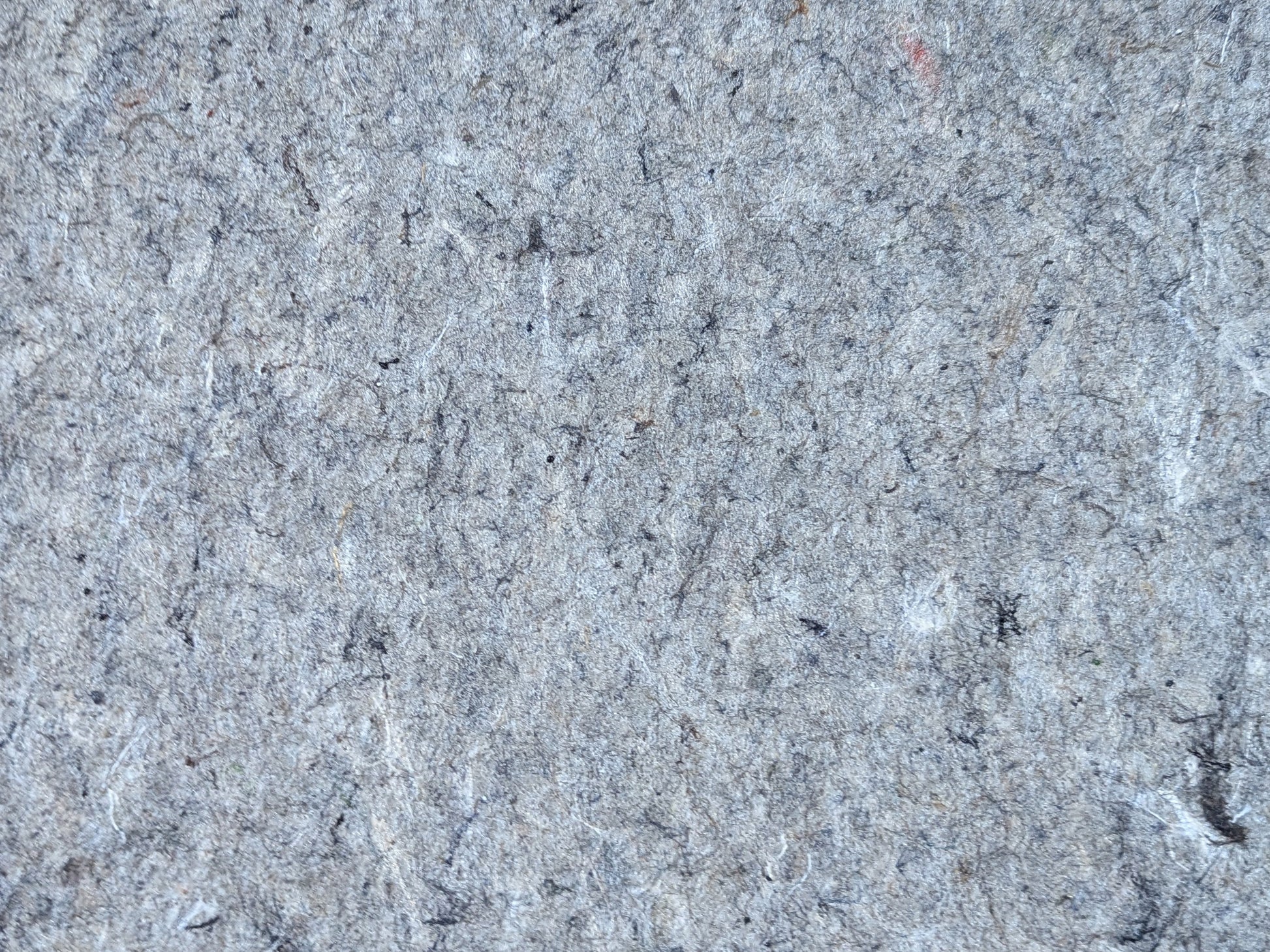 Recycled fiber surface of the low-profile all-surface rug pad