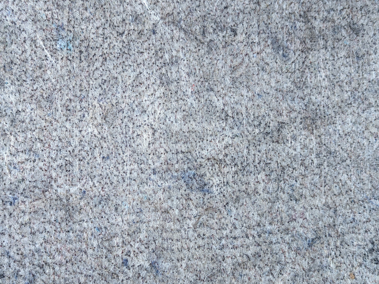 Recycled fiber surface of the designer cushioned rug pad