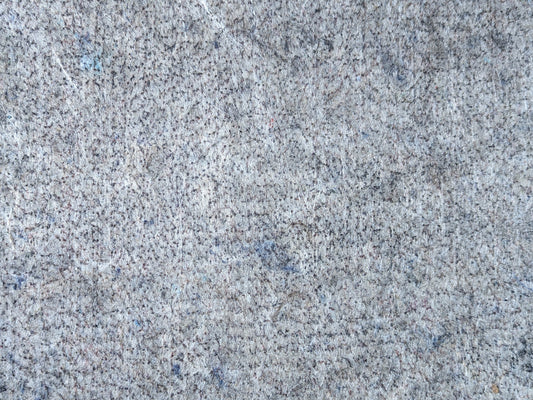 Recycled fiber surface of the designer cushioned rug pad
