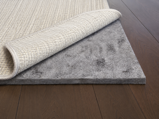 felt + rubber rug pad with rug on LVP